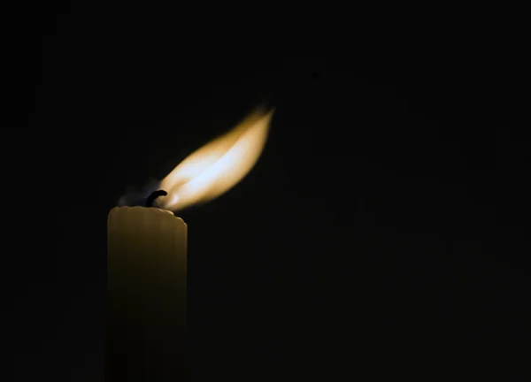 Candle in the dark room