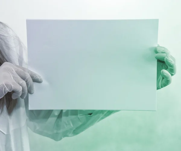 Doctor Holding Blank Paper