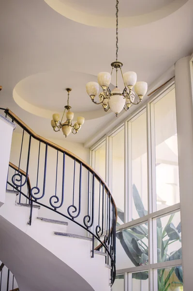 Staircase in the interior, chandeliers