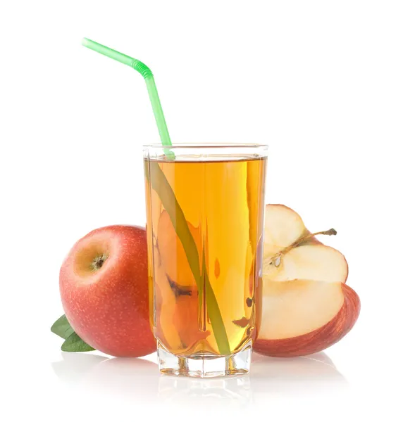 Apple juice in glass on white