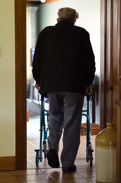 Elderly man use a walker (walking frame)