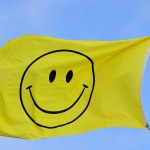 http://st.depositphotos.com/1585997/2618/i/110/depositphotos_26181069-Yellow-flag-with-smiley-face.jpg