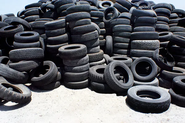 Pile of used rubber tyres