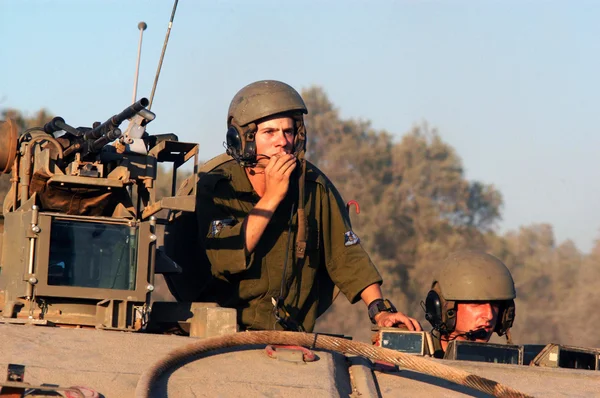 Israeli soldiers in armed vehicle