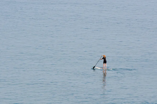Stand up paddle surfing