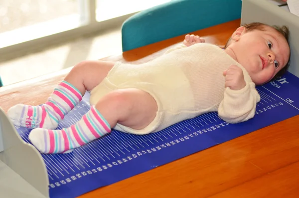 Infant baby body height examination