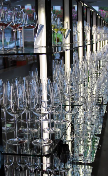 Wine glasses on display at glass factory showroom