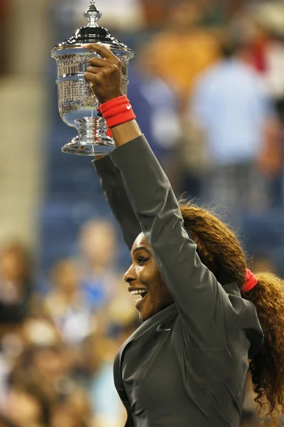 US Open 2013 champion Serena Williams holding US Open trophy after her final match win against Victoria Azarenka at Billie Jean King National Tennis Center