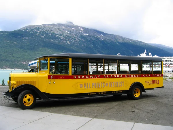 Skagway Alaska Street Car Tour bus at Skagway harbor in Alaska
