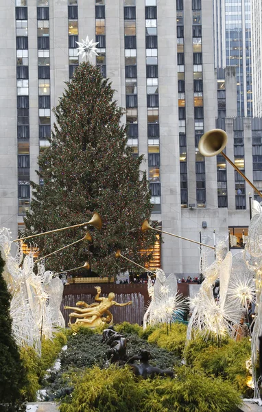 Rockefeller Center Christmas Tree and statue of Prometheus at the Lower Plaza of Rockefeller Center in Midtown Manhattan