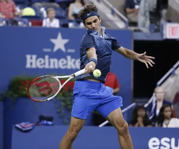 Seventeen times Grand Slam champion Roger Federer during third round match at US Open 2013 against Adrian Mannarino at Billie Jean King National Tennis Center