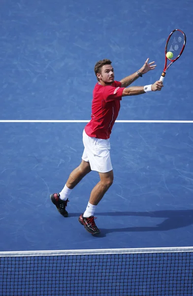 Professional tennis player Stanislas Wawrinka during semifinal match at US Open 2013 against Novak Djokovic at Billie Jean King National Tennis Center