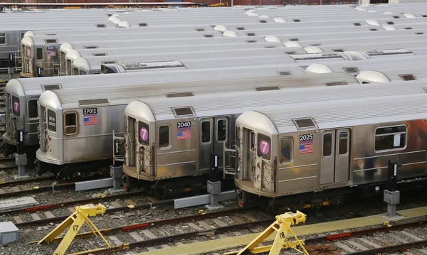 NYC subway cars in a depot