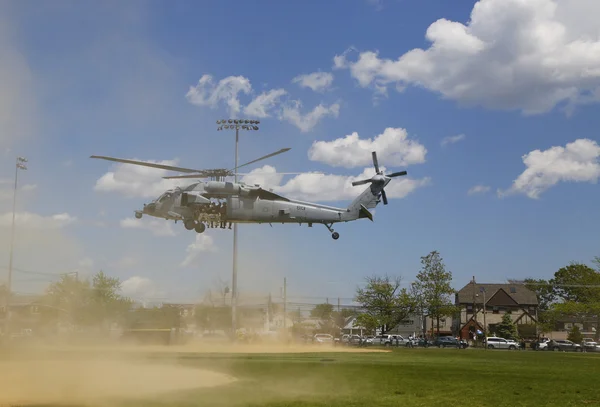 MH-60S helicopter from Helicopter Sea Combat Squadron Five with US Navy EOD team taking off after mine countermeasures demonstration