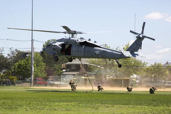 MH-60S helicopters from Helicopter Sea Combat Squadron Five with US Navy EOD team landing for mine countermeasures demonstration during Fleet Week 2014