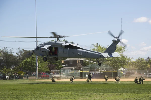 MH-60S helicopters from Helicopter Sea Combat Squadron Five with US Navy EOD team landing for mine countermeasures demonstration during Fleet Week 2014