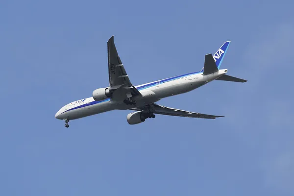 All Nippon Airways Boeing 777 in New York sky before landing at JFK Airport