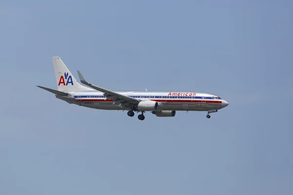American Airlines Boeing 737 in New York sky before landing at JFK Airport