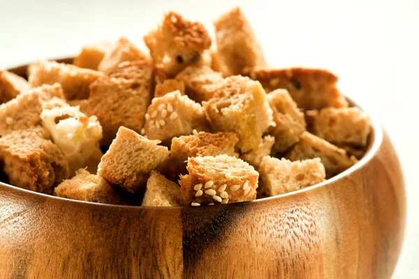 Croutons in wooden ware