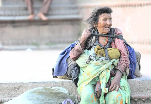 Old homeless woman. Durbar Square-Kathmandu.