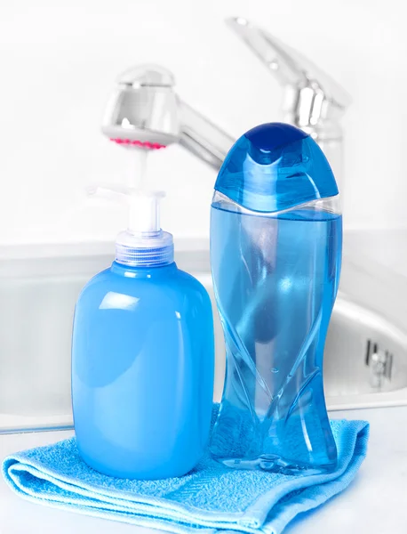 Plastic bottle with liquid soap in bathroom