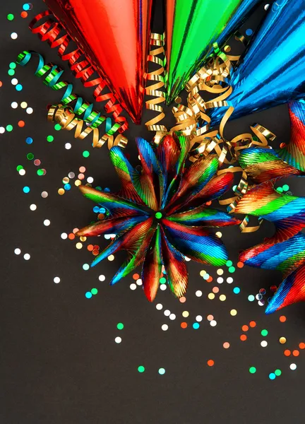 Carnival decoration with colorful garlands and confetti