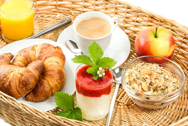 Breakfast with coffee, croissants and orange juice