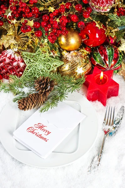 Christmas table place setting. candle light dinner