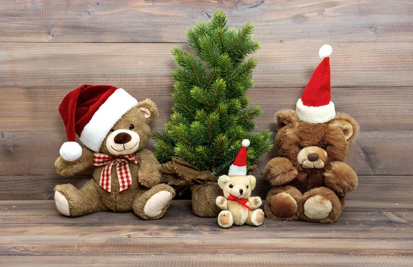 Christmas decoration with vintage toys teddy bear family