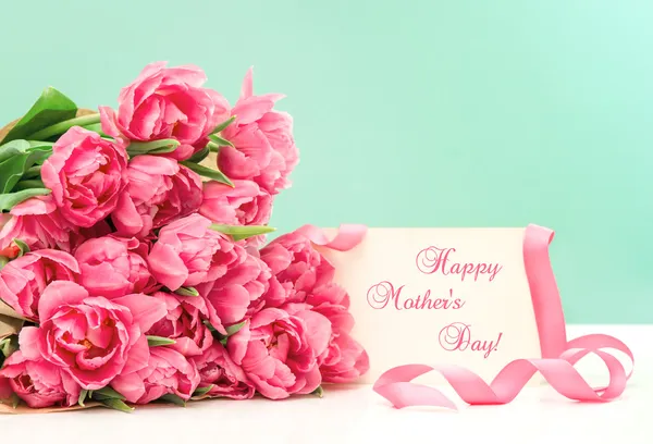 Pink tulips and greeting card