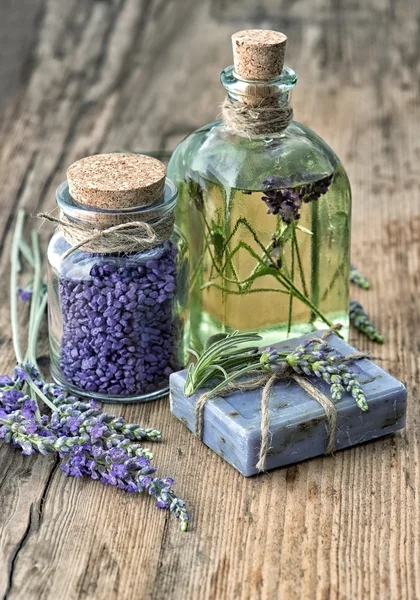 Lavender oil, herbal soap and bath salt with flowers
