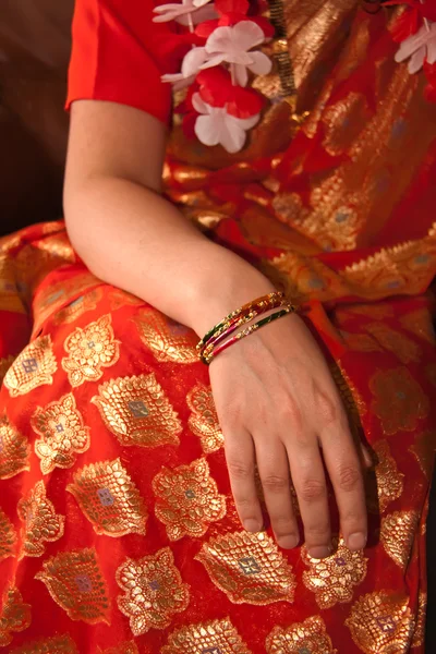 Orange Sari with Bangled wrist