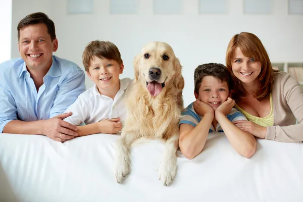 Happy family with dog