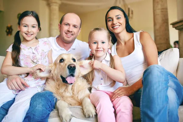 Father, mother, two daughters and dog