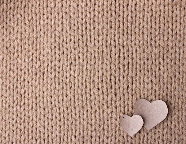 Handmade knit texture with hearts