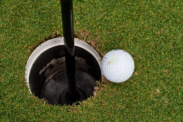Golf holes and Golf ball