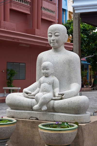 Mother and Sun statue