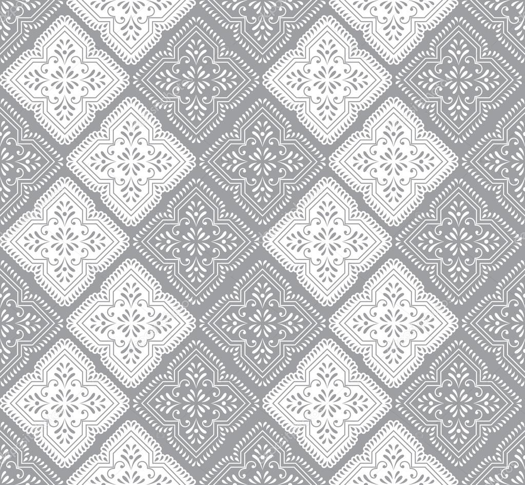 Seamless paisley wallpaper in silver — Stock Vector © malkani 15649035