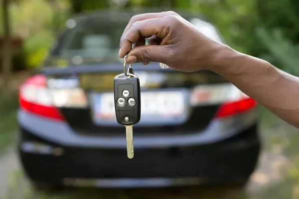 Man holding car keys