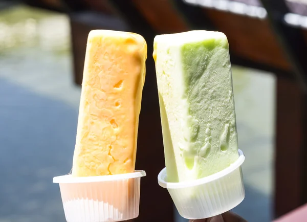 Two ice cream bars.