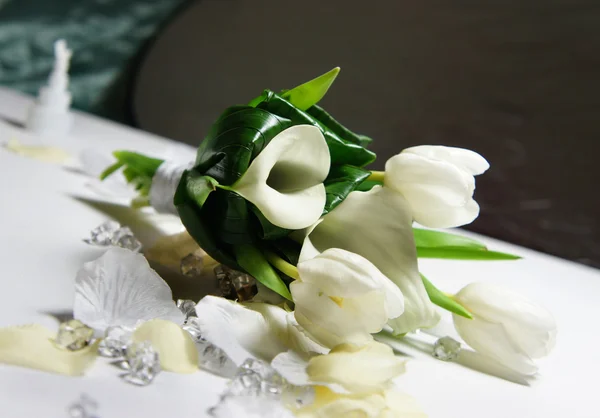 Beautiful wedding bouquet of white callas and tulips