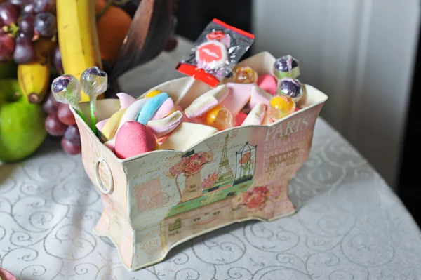 Nice wedding decorative box with colored candies and lollipops
