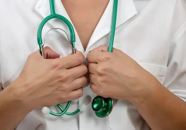 Cardiologist holding stethoscope