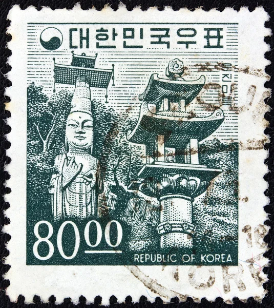 SOUTH KOREA - CIRCA 1966: A stamp printed in South Korea showing Unjinmiruk Buddha statue, Kwanchok Temple, circa 1966.