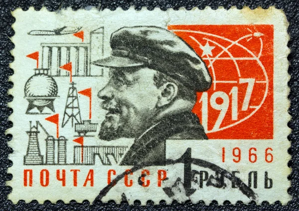 USSR - CIRCA 1966: A postage stamp printed in USSR shows Russian Marxist revolutionary and communist politician Vladimir Ilyich Lenin and the year of the October revolution (1917), circa 1966.