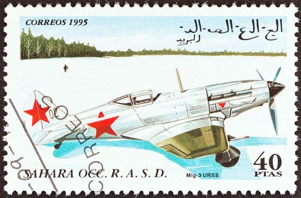 WESTERN SAHARA - CIRCA 1995: A stamp printed in Western Sahara shows a MiG-3 aircraft, USSR, circa 1995.