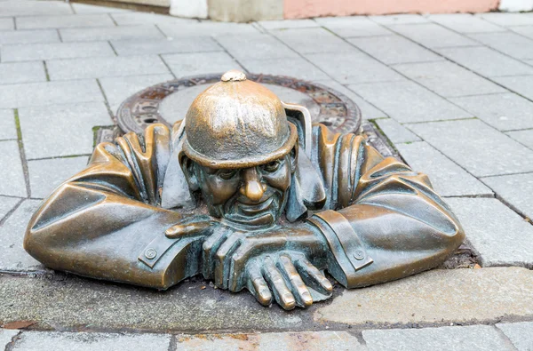 Street statue of Man at Work in Bratislava called Cumil, Slovakia