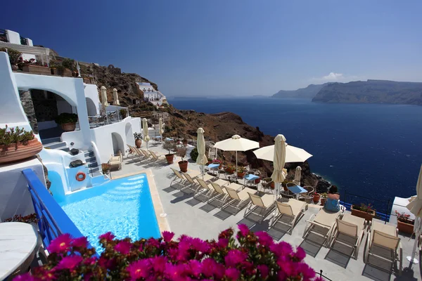 Luxury resort swimming pool in Santorini, Greece