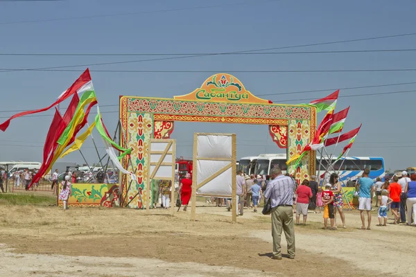 Decorated with the flags of the gate with the words Sabantuy - the main entrance to the territory festival