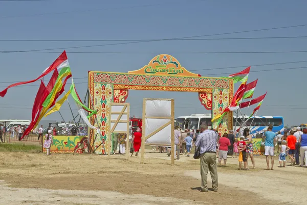 Decorated with the flags of the gate with the words Sabantuy - the main entrance to the territory festival